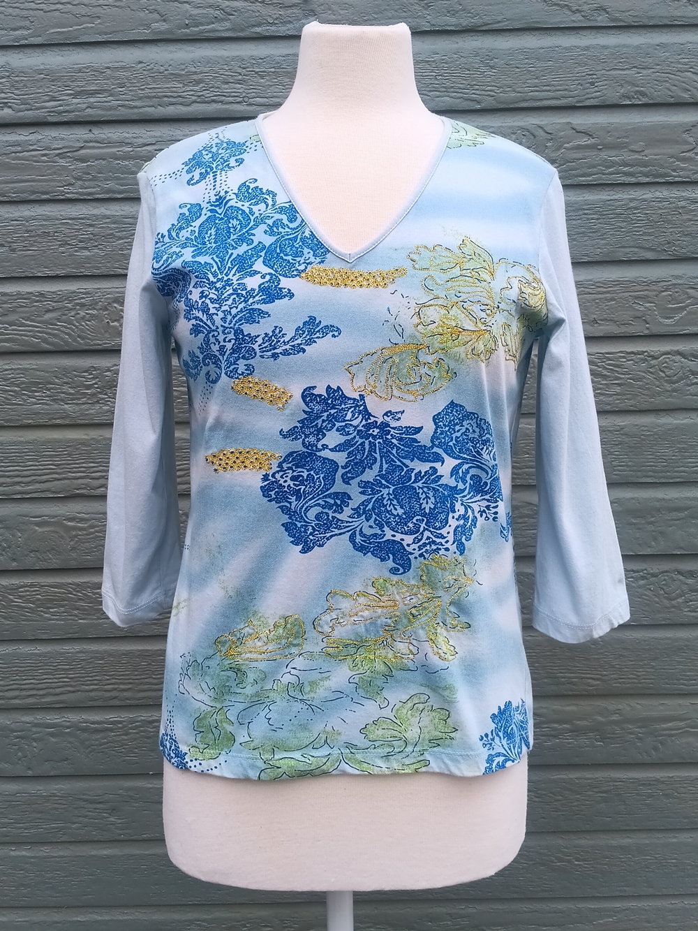 Caribbean Joe Light Blue V‑Neck Floral & Gold Accent Top